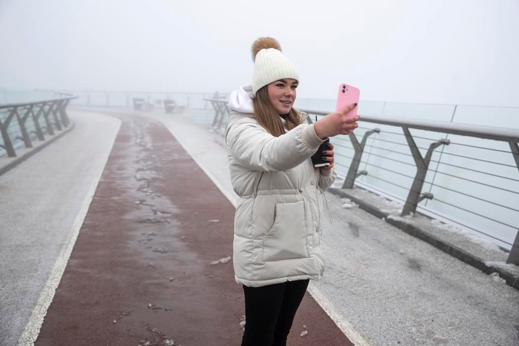 'Glass' pedestrian bridge in Kyiv reopens after being damaged by Russian missile attack