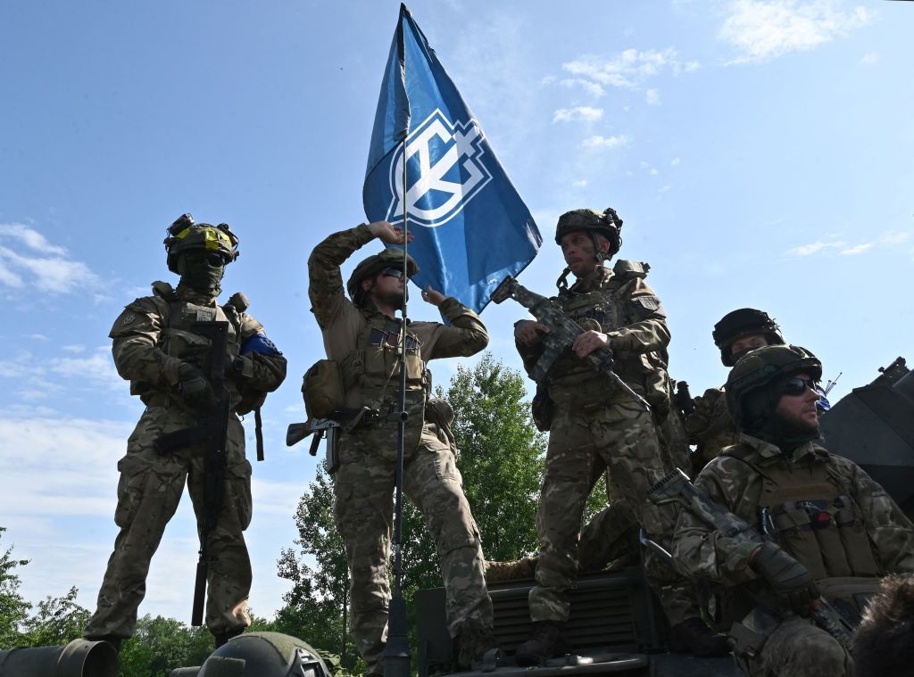 Fighters of the Russian Volunteer Corps attend a presentation for the media in northern Ukraine.