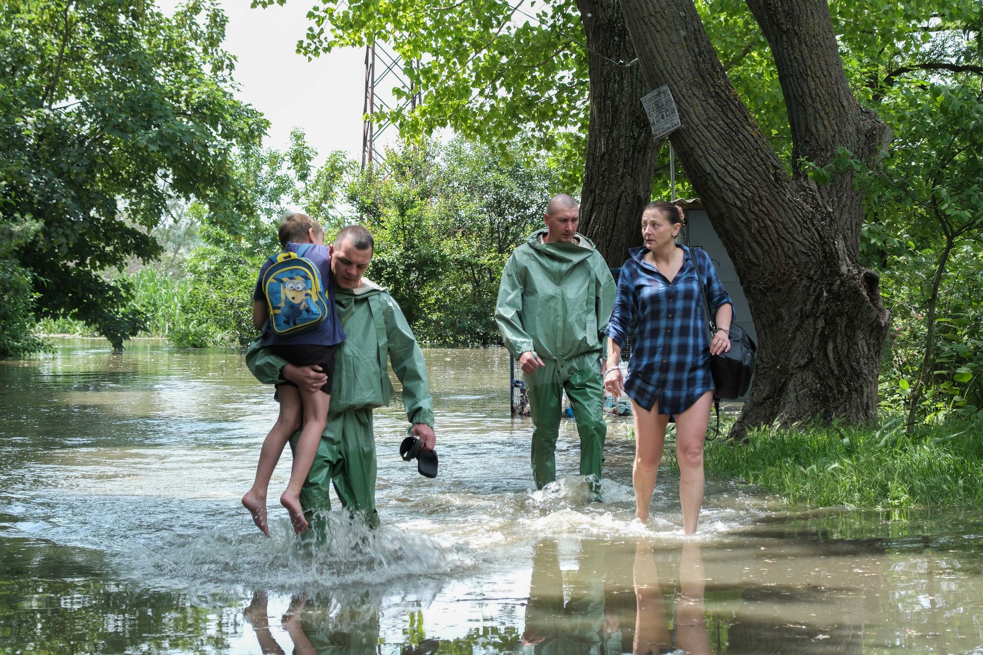 Saving lives from Russia’s flood: Inside inundated, shelled Kherson