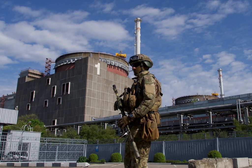 A Russian serviceman patrols the Zaporizhzhia Nuclear Power Plant in Enerhodar, Zaporizhzhia Oblast, on May 1, 2022. 