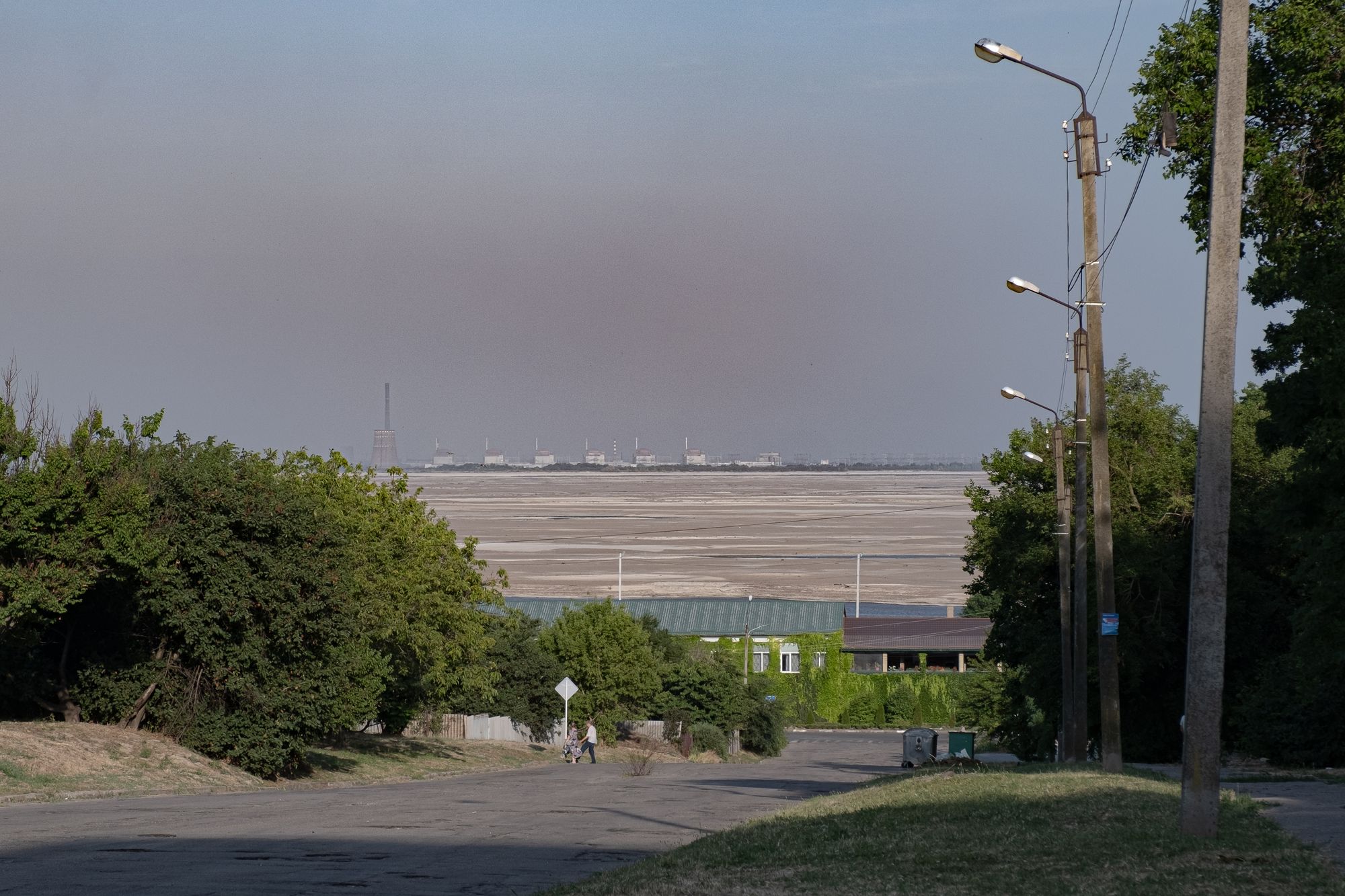 The Zaporizhzhia Nuclear Power Plant as seen from the streets of Nikopol, the city in Dnipropetrovsk Oblast, on July 6, 2023.