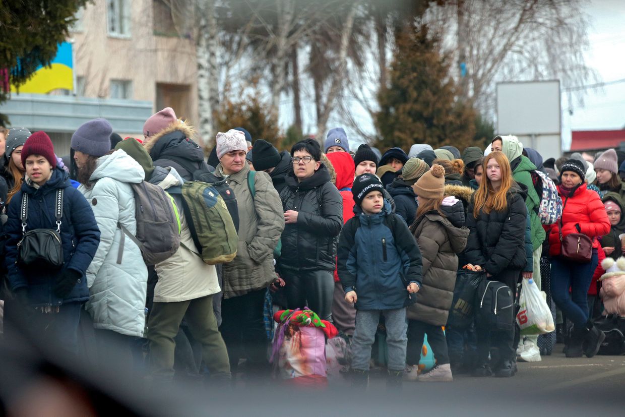 Poland says it may cut aid for Ukrainian refugees next year