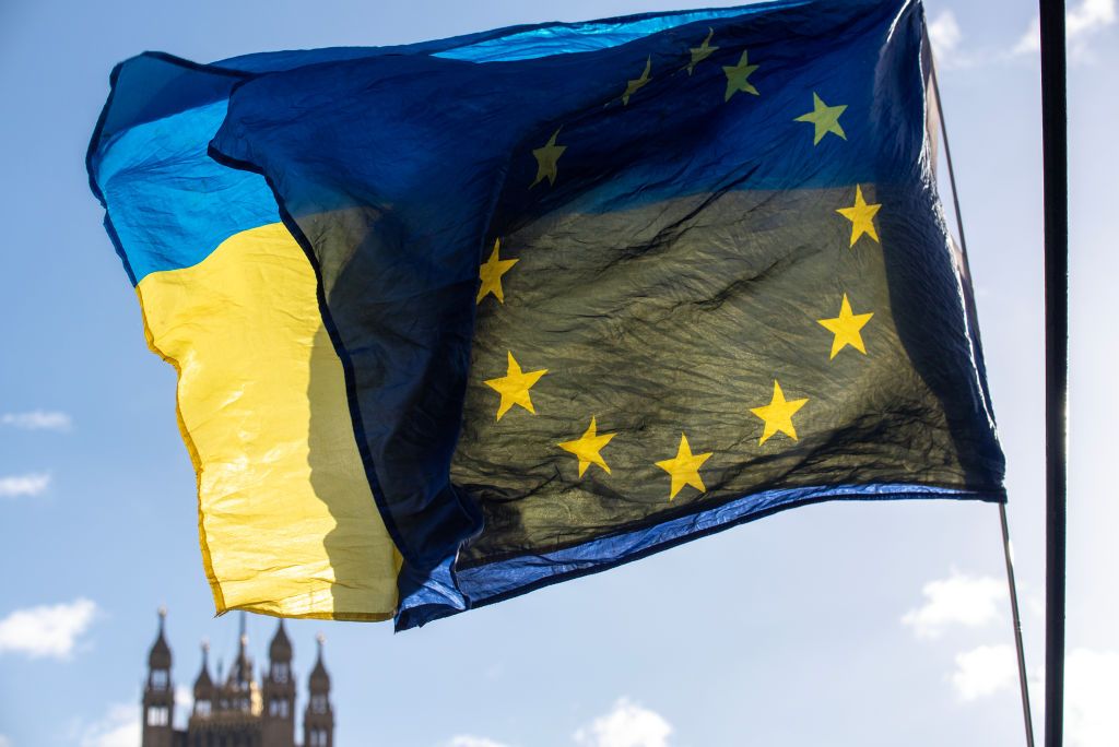 The EU flag and the Ukrainian flag by the Tower of the British Parliament as part of a pro-EU demonstration in London.