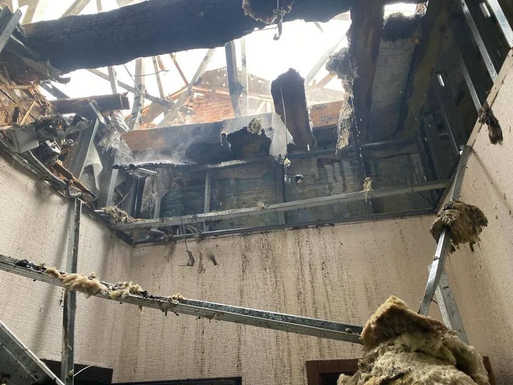 Russian forces destroy hotel in Kharkiv Oblast, civilian remains trapped under rubble