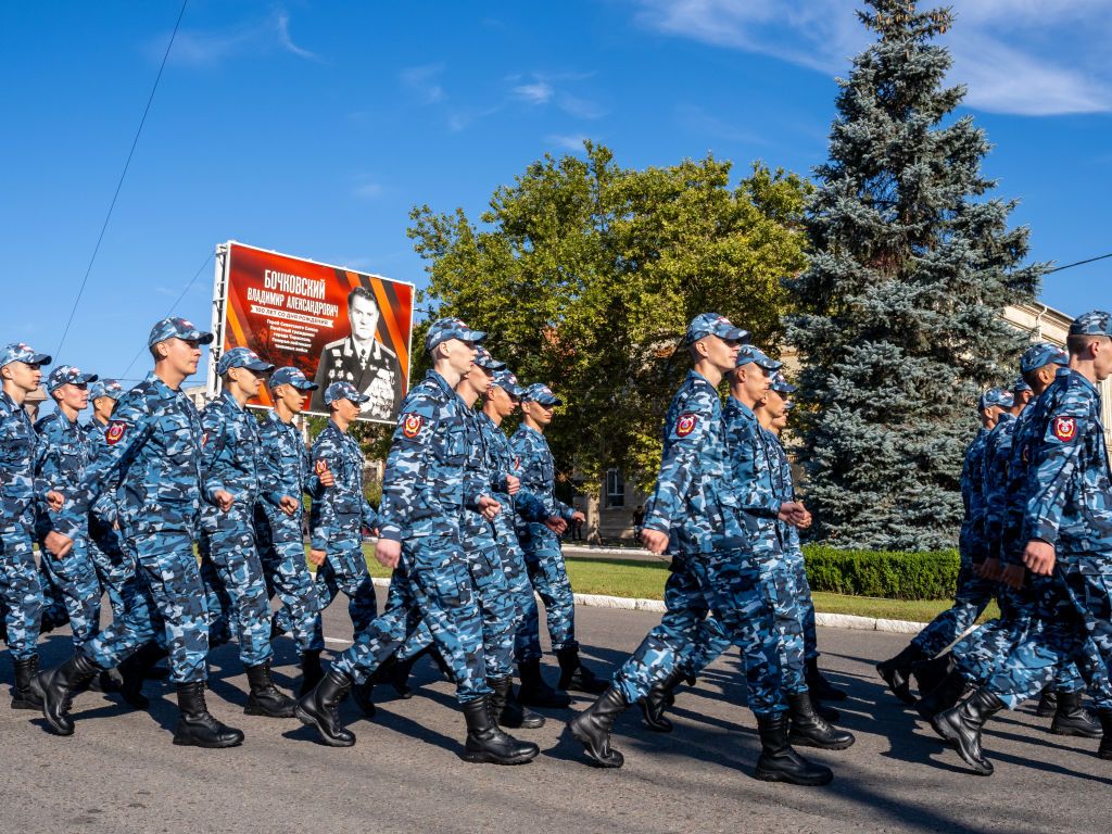 Cadets march along 25 October Street on Republic Day in Tiraspol.