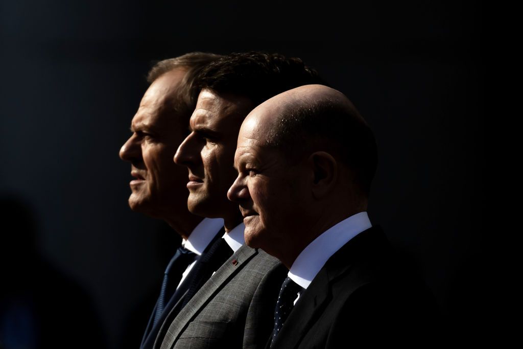 Polish Prime Minister Donald Tusk (L), French President Emmanuel Macron (C), and German Chancellor Olaf Scholz (R) at a joint meeting in Berlin, Germany, on March 15, 2024. 