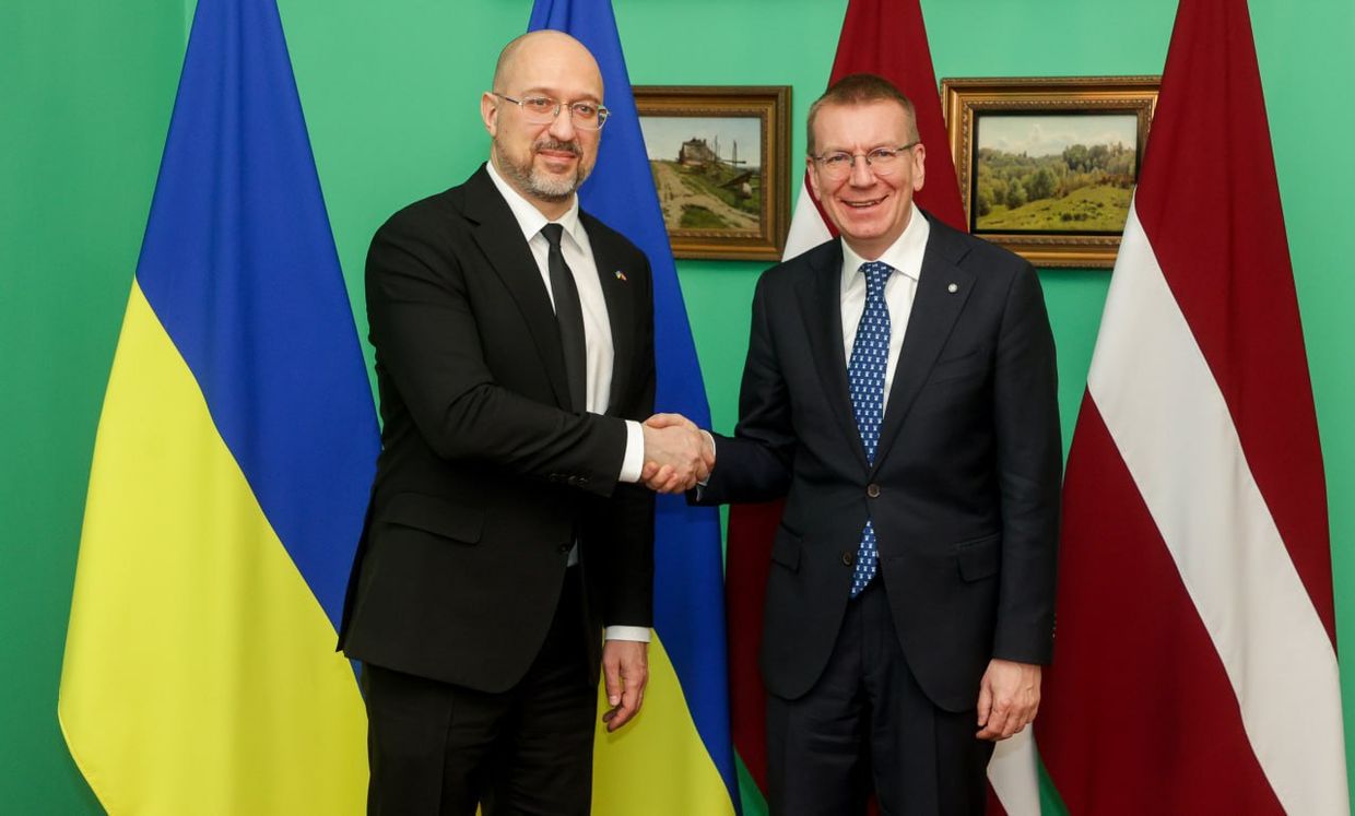 Ukraine's Prime Minister Denys Shmyhal (L) and Latvia's President Edgars Rinkevics in Riga, Latvia, on April 4, 2024.