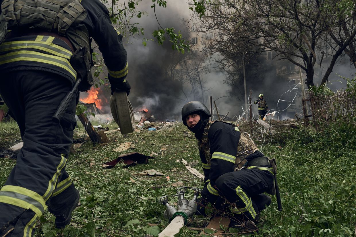  Emergency services fight a fire after a Russian UMPB D-30 guided bomb airstrike near Kharkiv, Ukraine, on May 14, 2024.