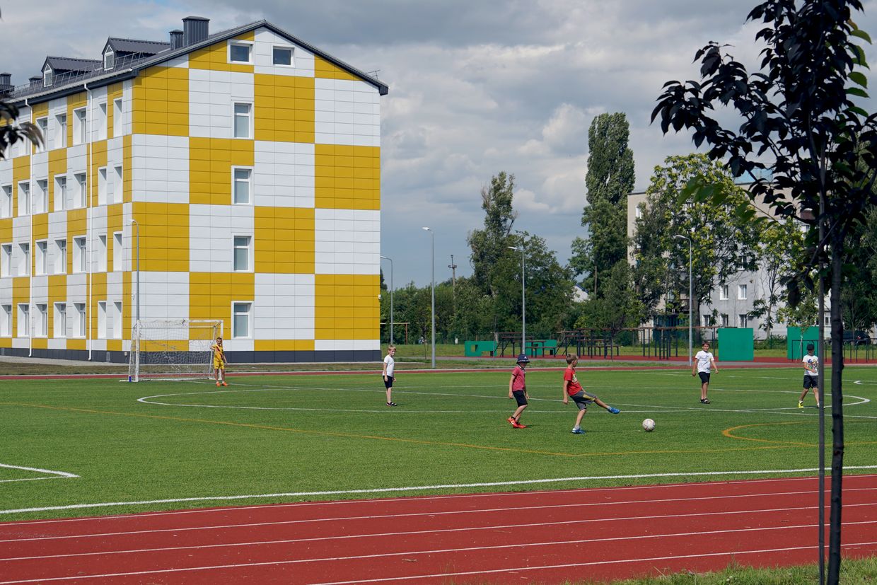 Children play in a schoolyard in Pereshchepyne, Dnipropetrovsk Oblast, Ukraine