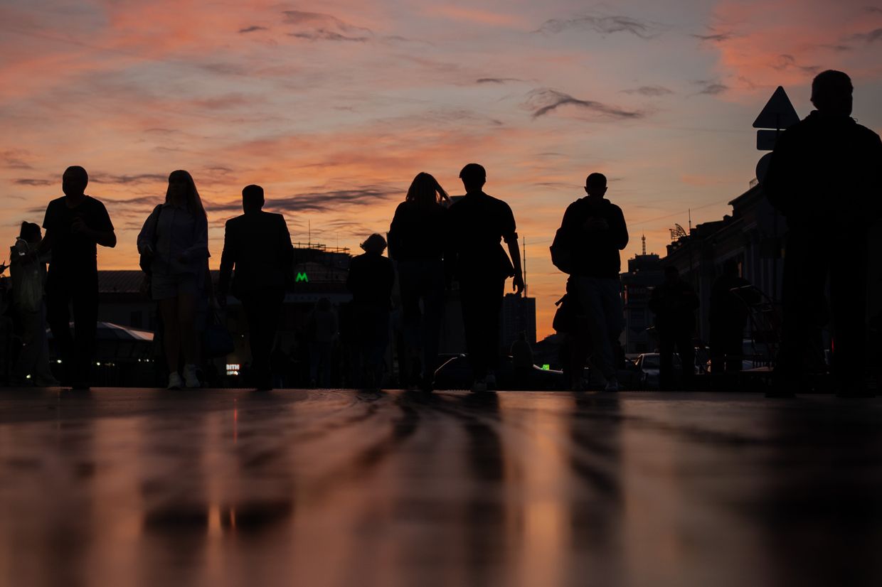 People walk to the railway station in Kyiv, Ukraine, on June 12, 2024. 