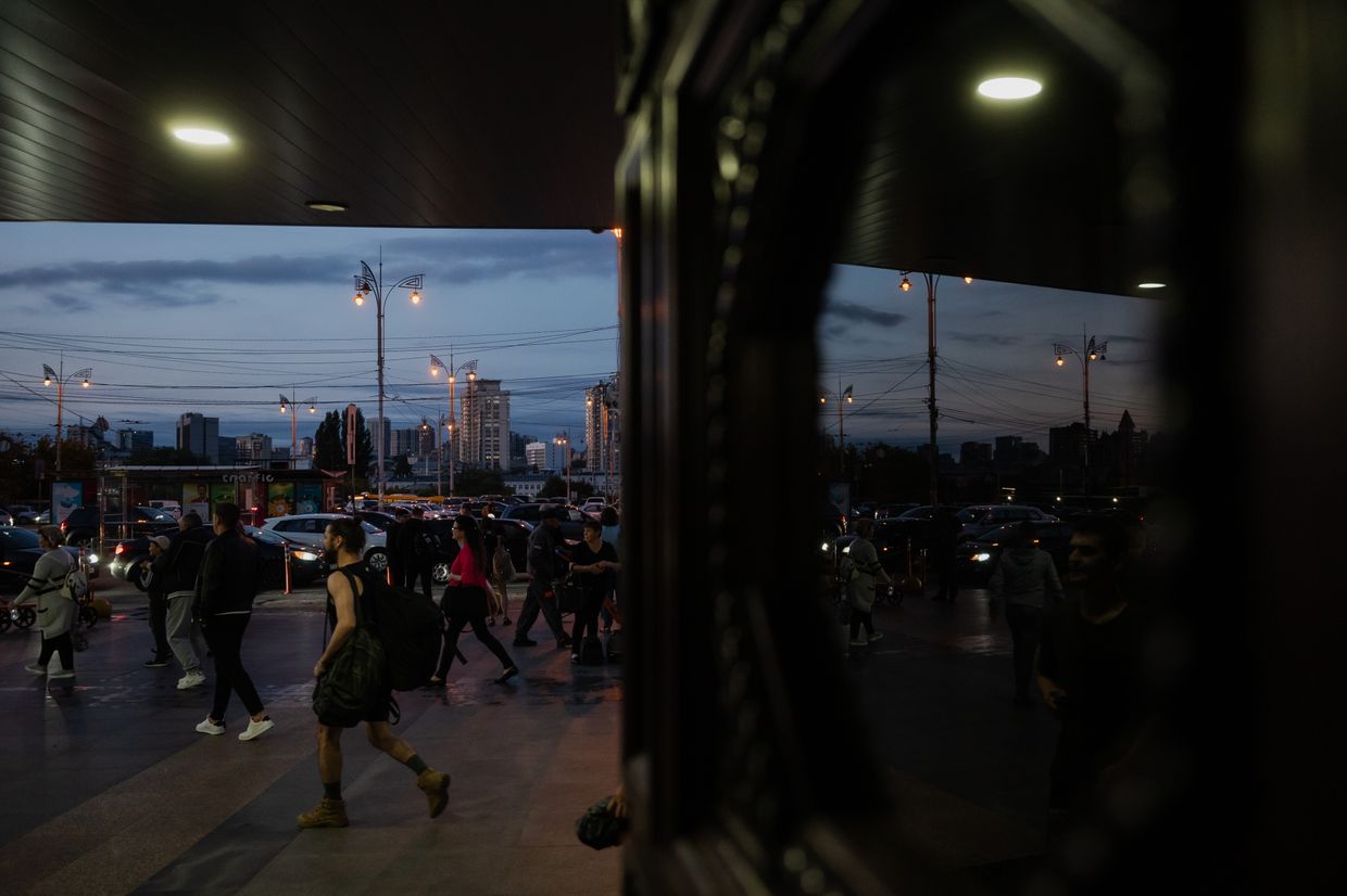 People walk to the railway station in Kyiv