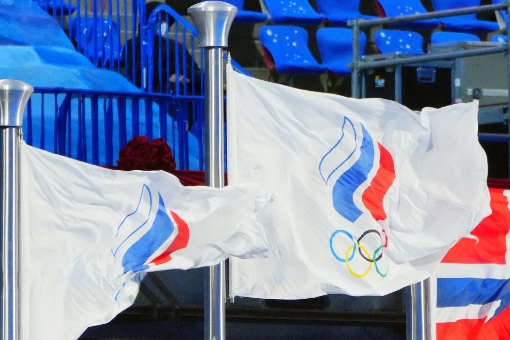 The Russian Olympic Committee (ROC) flag flies at the closing ceremony of the 2022 Winter Olympics in Beijing