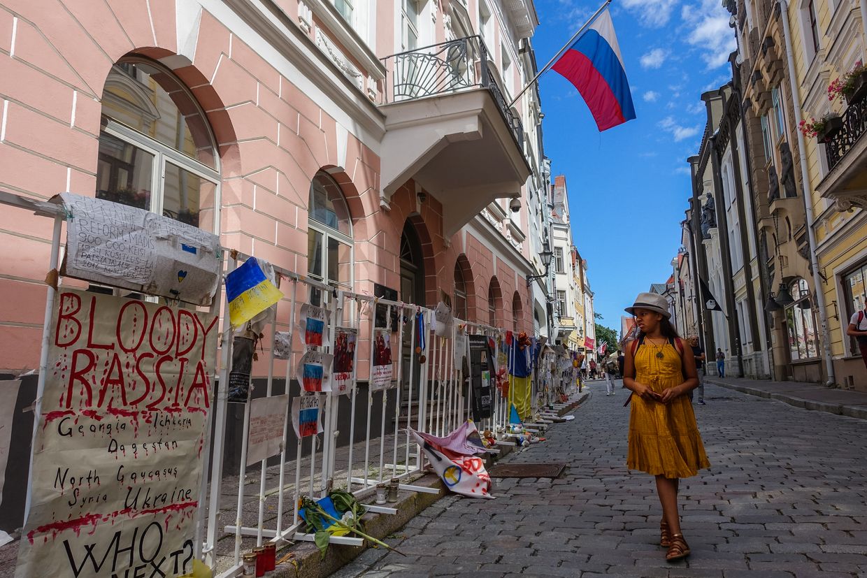 Banners in support of Ukraine and condemnation of the Russian invasion hung on the fence in front of the Russian Federation