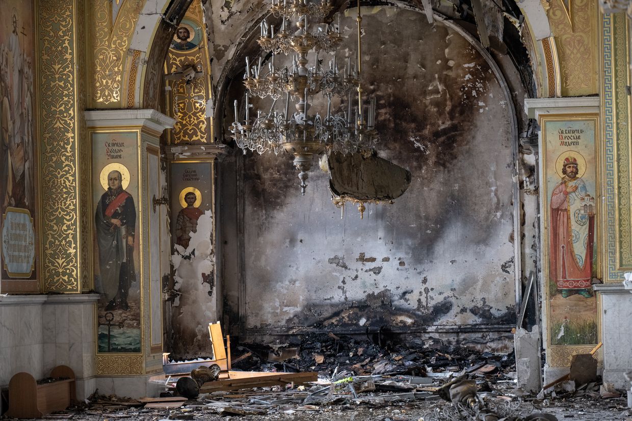 Ukrainians clear away debris after a Russian missile struck the historic Holy Transfiguration (Spaso-Preobrazhensky) Cathedral in central Odesa, Ukraine
