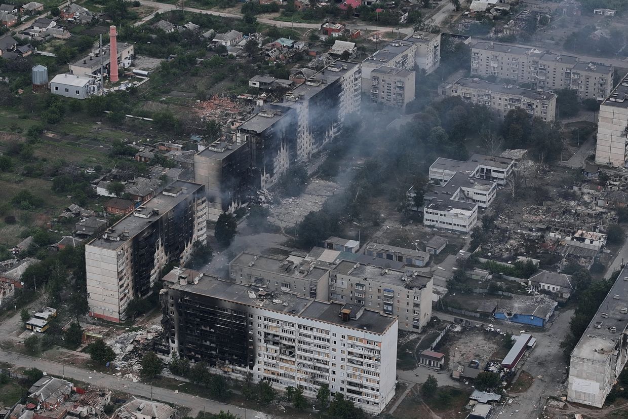 In this aerial view, smoke rises from the Ukrainian border city of Vovchansk, which is bombarded daily by heavy artillery