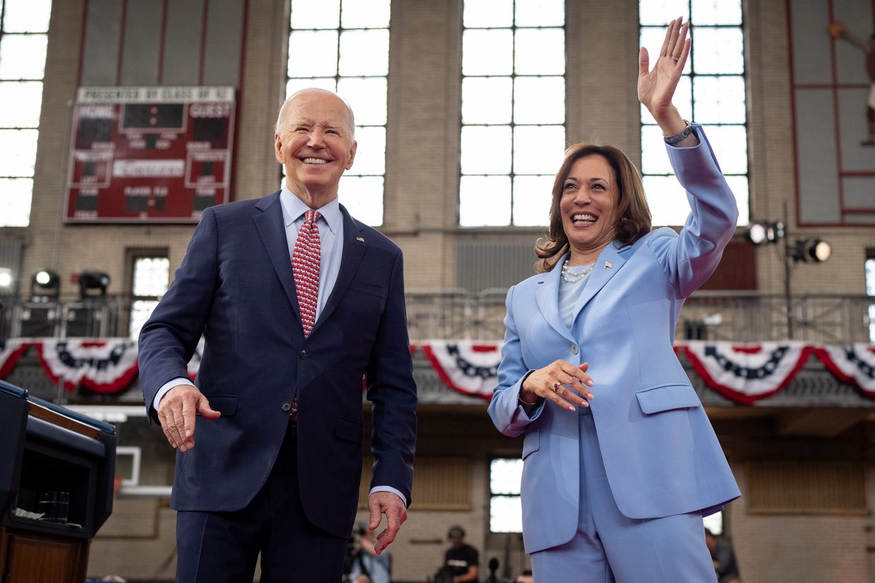 U.S. President Joe Biden and U.S. Vice President Kamala Harris wave to members of the audience