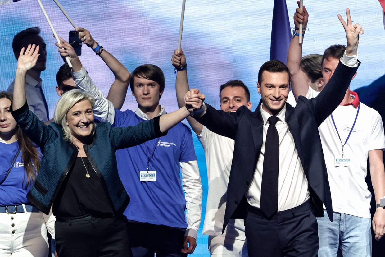 French far-right party Rassemblement National (RN) party's lead candidate Jordan Bardella (C-R) and RN parliament group president Marine Le Pen (C-L) 