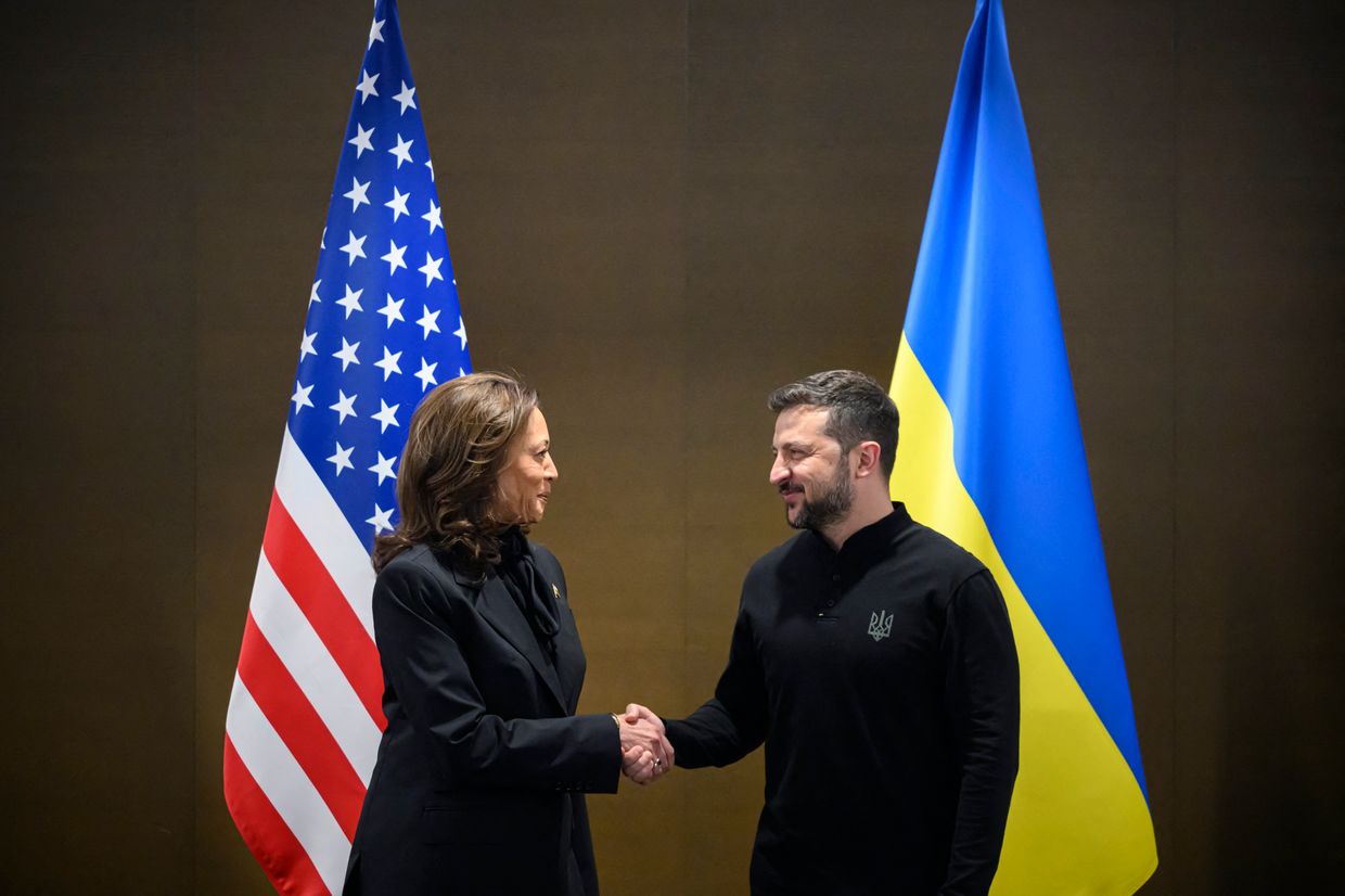 US Vice President Kamala Harris (L) shakes hands with Ukraine's President Volodymyr Zelensky 