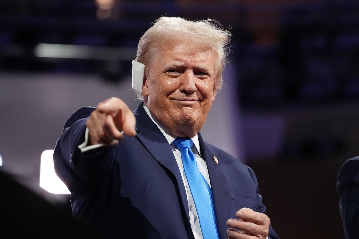 Republican presidential candidate, former U.S. President Donald Trump points to the crowd