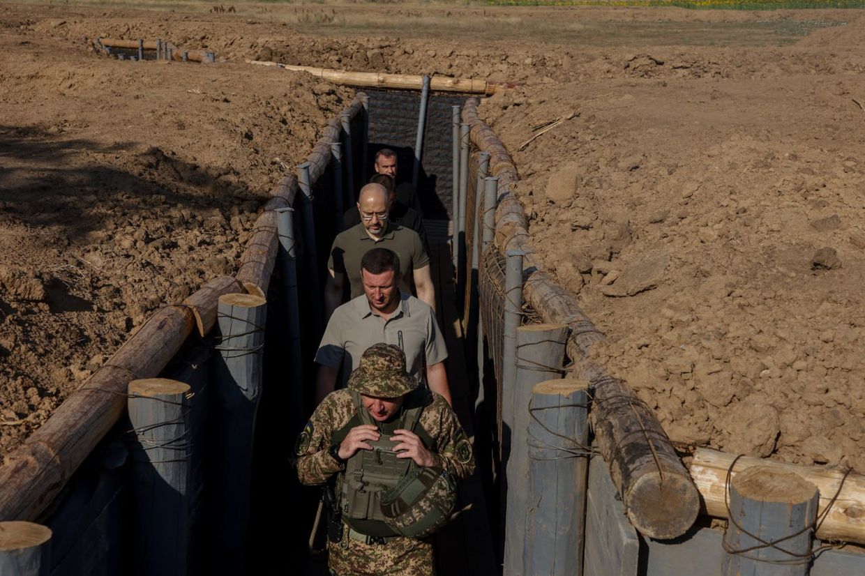 Prime Minister Denys Shmyhal inspecting fortifications in Kherson Oblast.