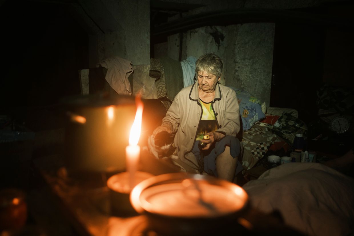 Tetiana, 73, in her basement in Toretsk, Ukraine, on July 3, 2024. 