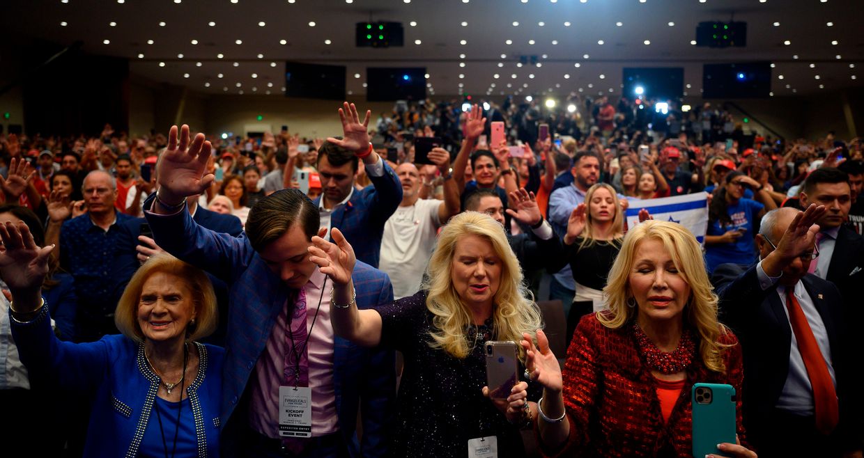 Supporters pray as US President Donald Trump speaks during an 'Evangelicals for Trump' campaign event held at the King Jesus International Ministry in Miami, Florida, US on Jan. 3, 2020. 