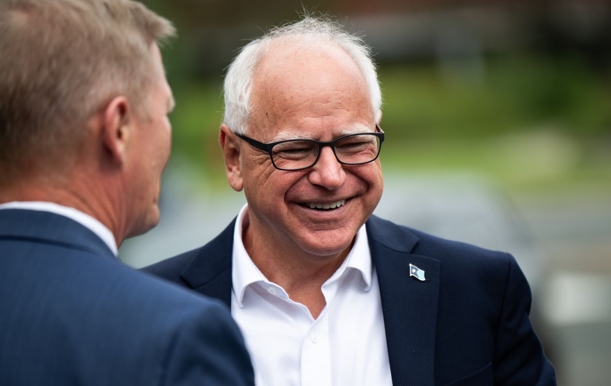 Minnesota Governor Tim Walz arrives to speak at a press conference regarding new gun legislation at City Hall in Bloomington, Minnesota