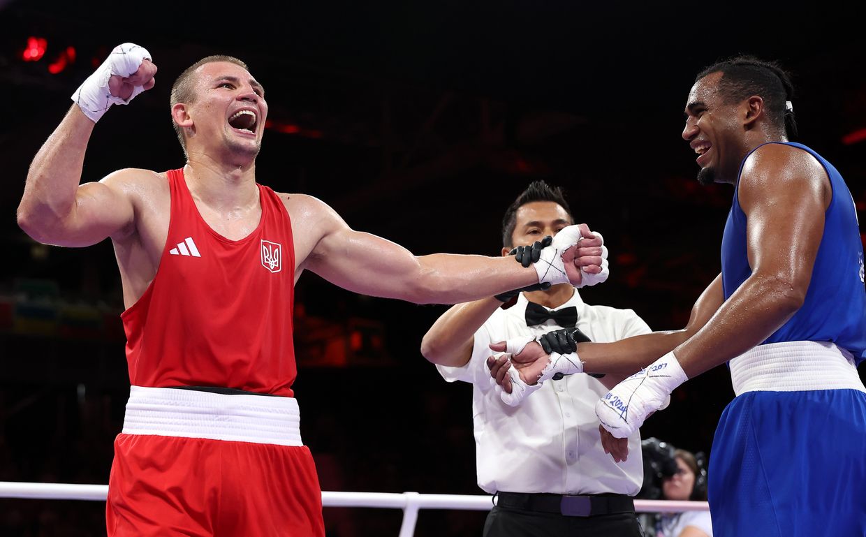 Ukraine’s boxer Khyzhniak reaches Olympic finals, securing at least silver