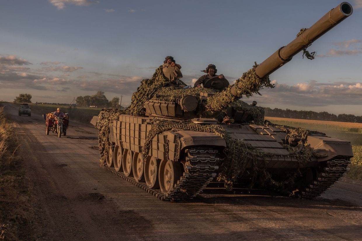 Ukrainian servicemen operate a Soviet-made T-72 tank in the Sumy Oblast, near the border with Russia