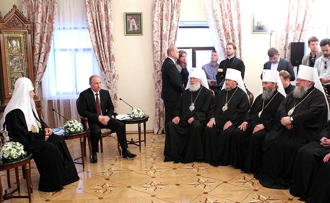 Patriarch Kirill of Moscow and Russian President Vladimir Putin meet with the Holy Synod of the Ukrainian Orthodox Church of the Moscow Patriarchate in Kyiv, Ukraine, on July 27, 2013.