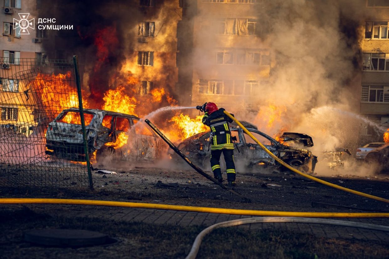 Cars on fire following a Russian attack against Sumy, Ukraine, on the morning of Aug. 17, 2024.