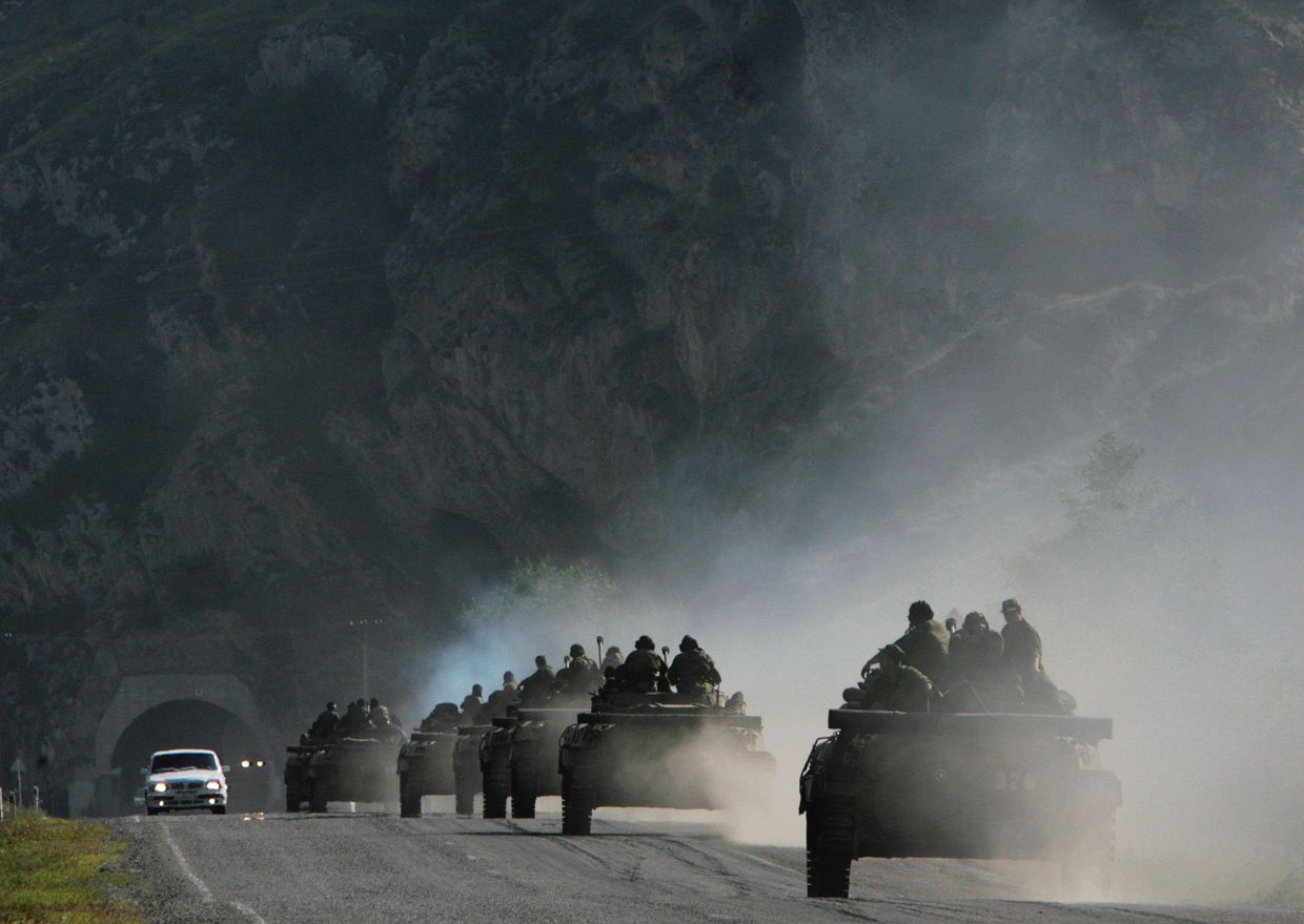 A convoy of Russian troops makes its way through the mountains in the direction of Tskhinvali 