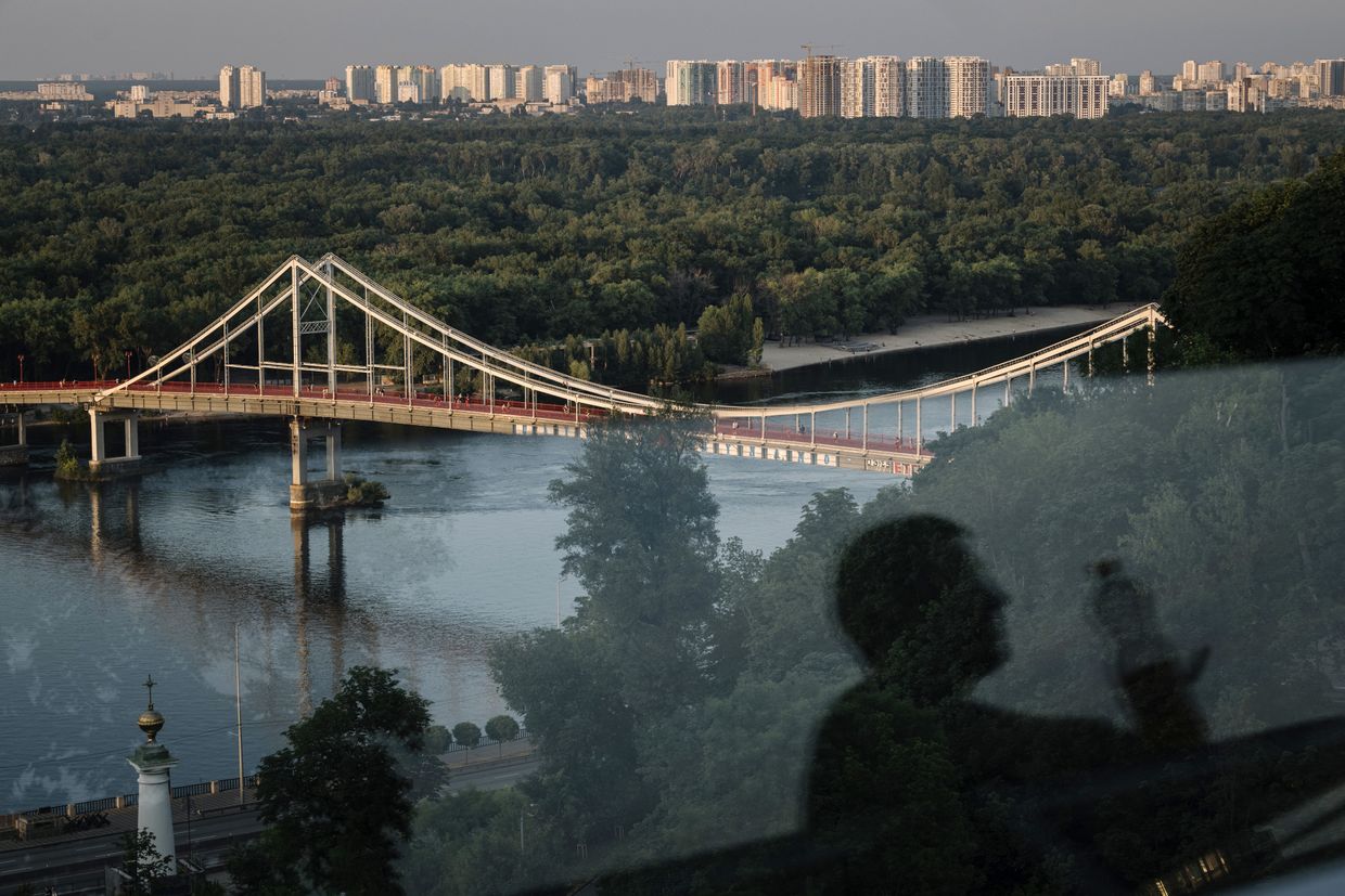 The Dnipro River and city skyline from the Klitchko Pedestrianized Bicycle Bridge, known as the Glass Bridge