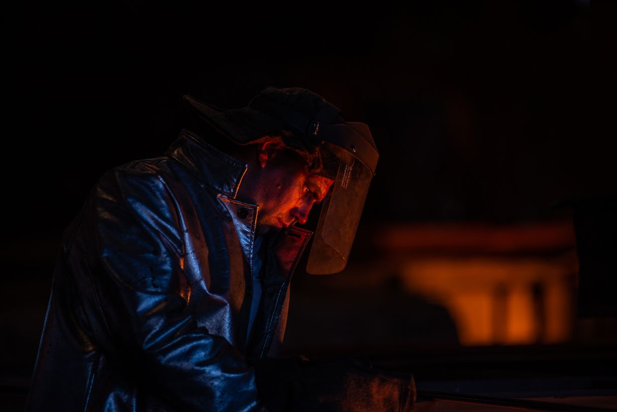 An employee supervises the only operational blast furnace at the ArcelorMittal SA steel plan