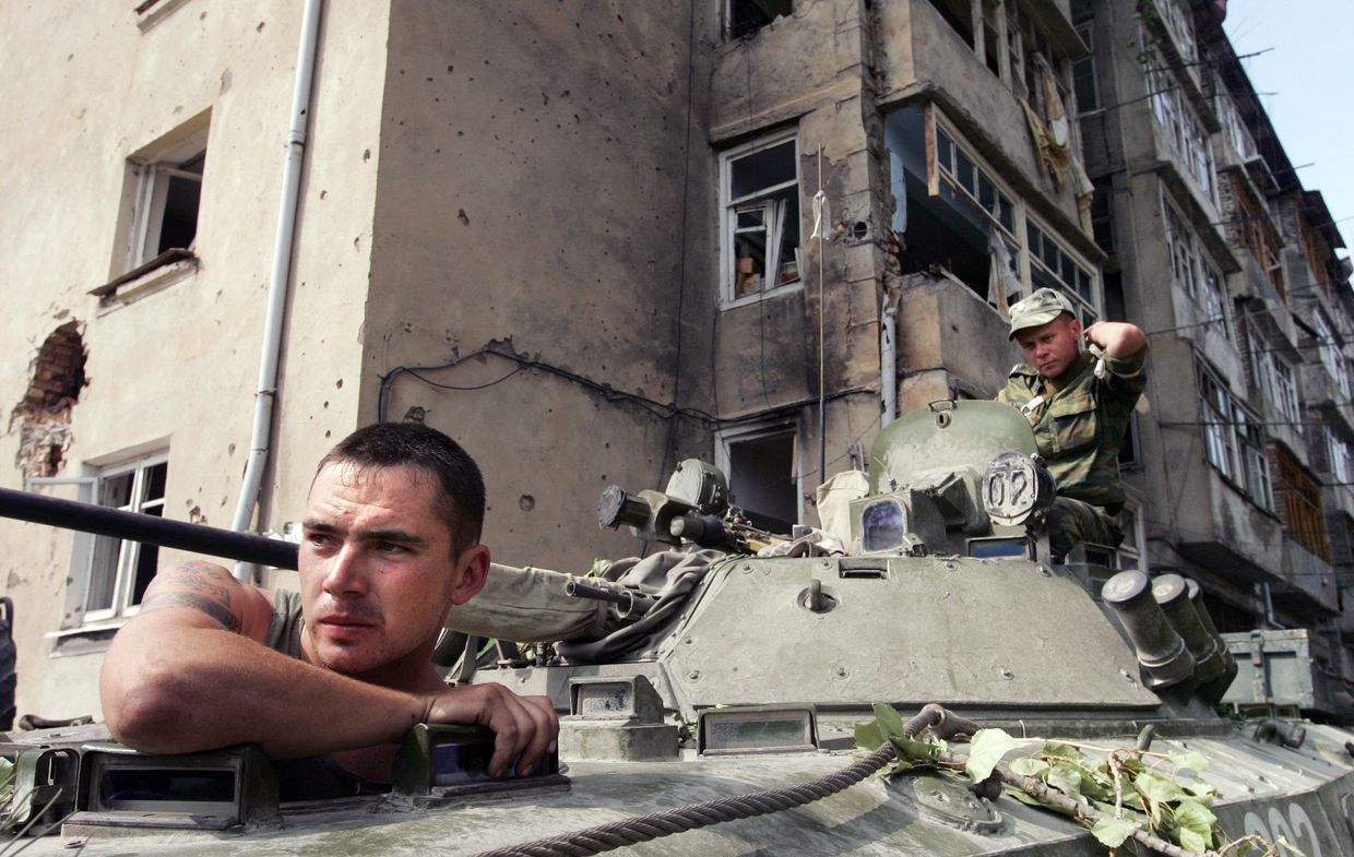 Russian soldiers sit in APC in the centre of Tskhinvali, Georgia on Aug. 12, 2008.