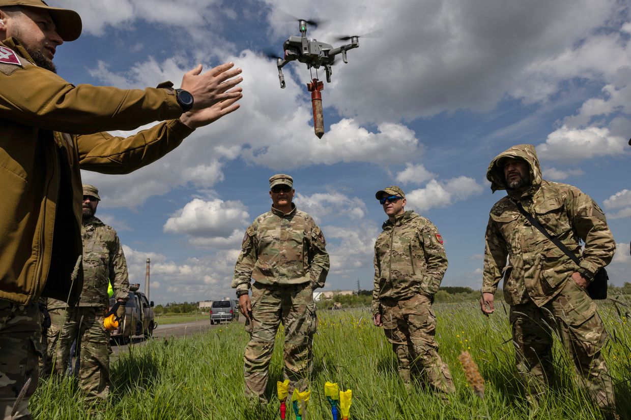 Ukrainian military learn to fly drones with bombs attached at a special school in Lviv Oblast, Ukraine on on May 12, 2023.