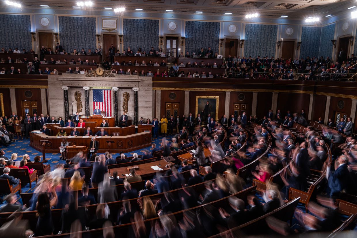 Republican members rise in the House chamber of the U.S. Capitol 