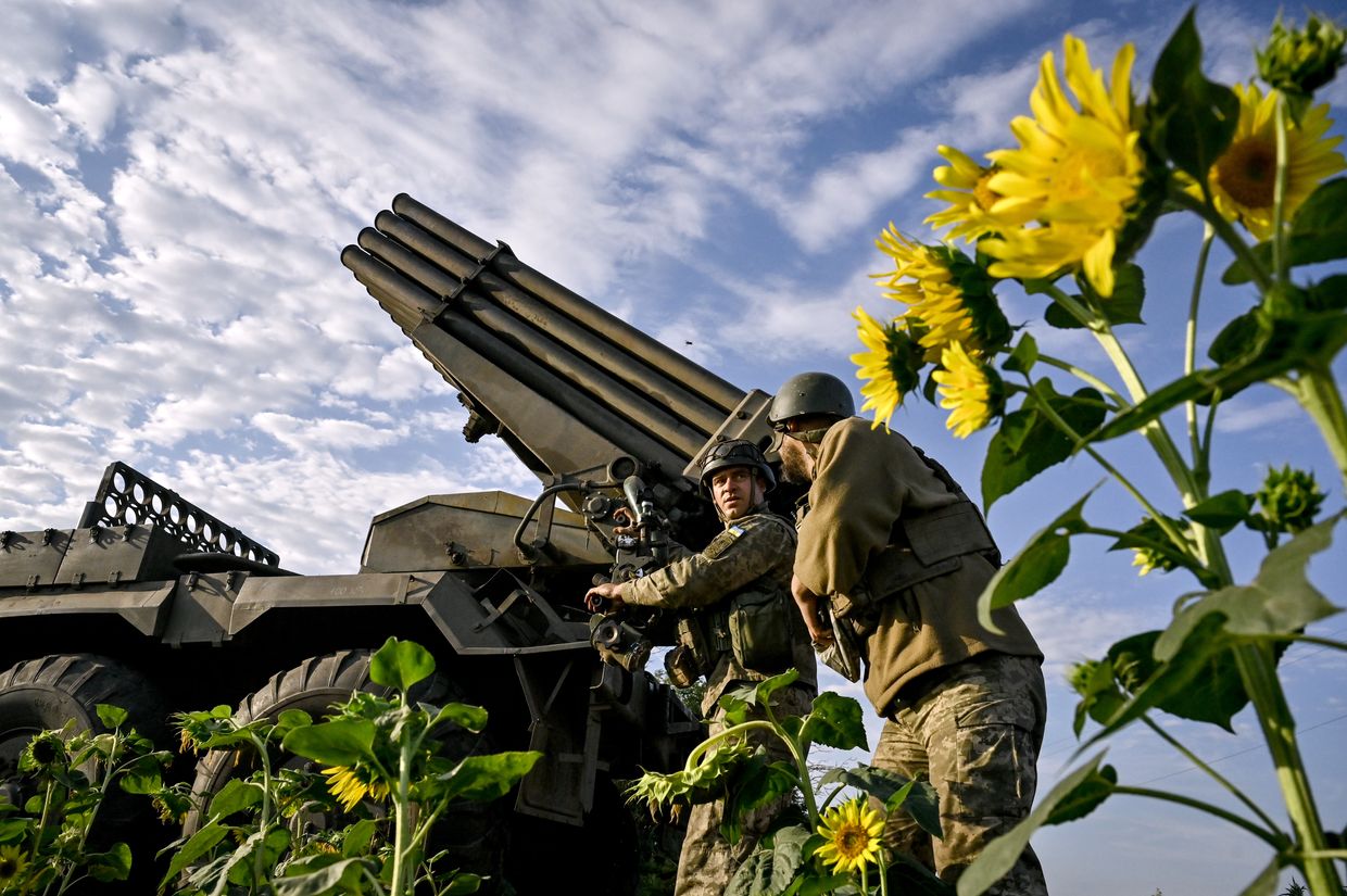 Artillerymen of the 110th Separate Mechanized Brigade deployed on the Pokrovsk front operate an RM-70 multiple rocket launcher at a firing position 