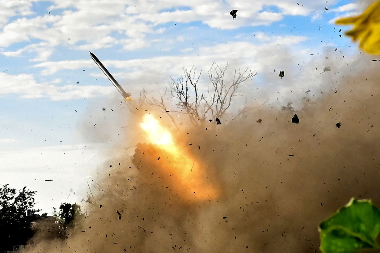 Artillerymen of the 110th Separate Mechanized Brigade are firing an RM-70 multiple rocket