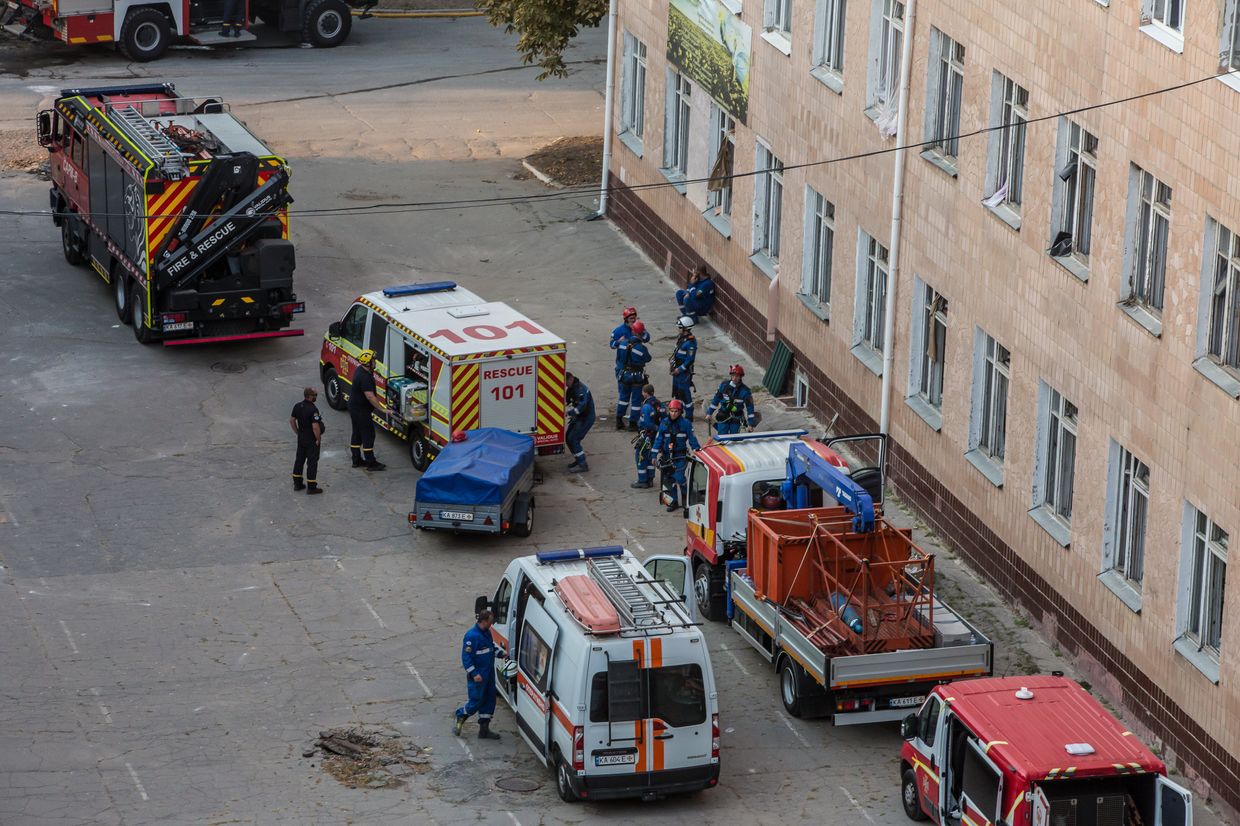 Rescue workers and vehicles near the site of the Russian missile attack in Poltava, Ukraine, September 3, 2024. 