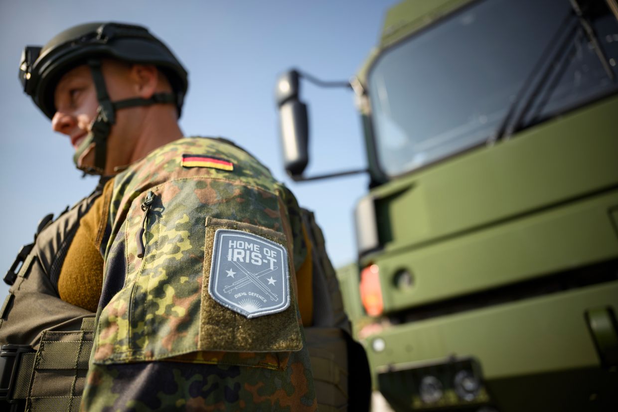 A soldier wears a patch to commemorate his training on the IRIS-T air defense system during the operative launch