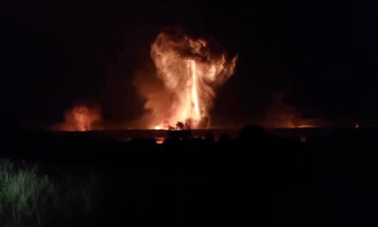 A screenshot from a video purportedly showing the moment an ammunition depot in Tver Oblast, Russia