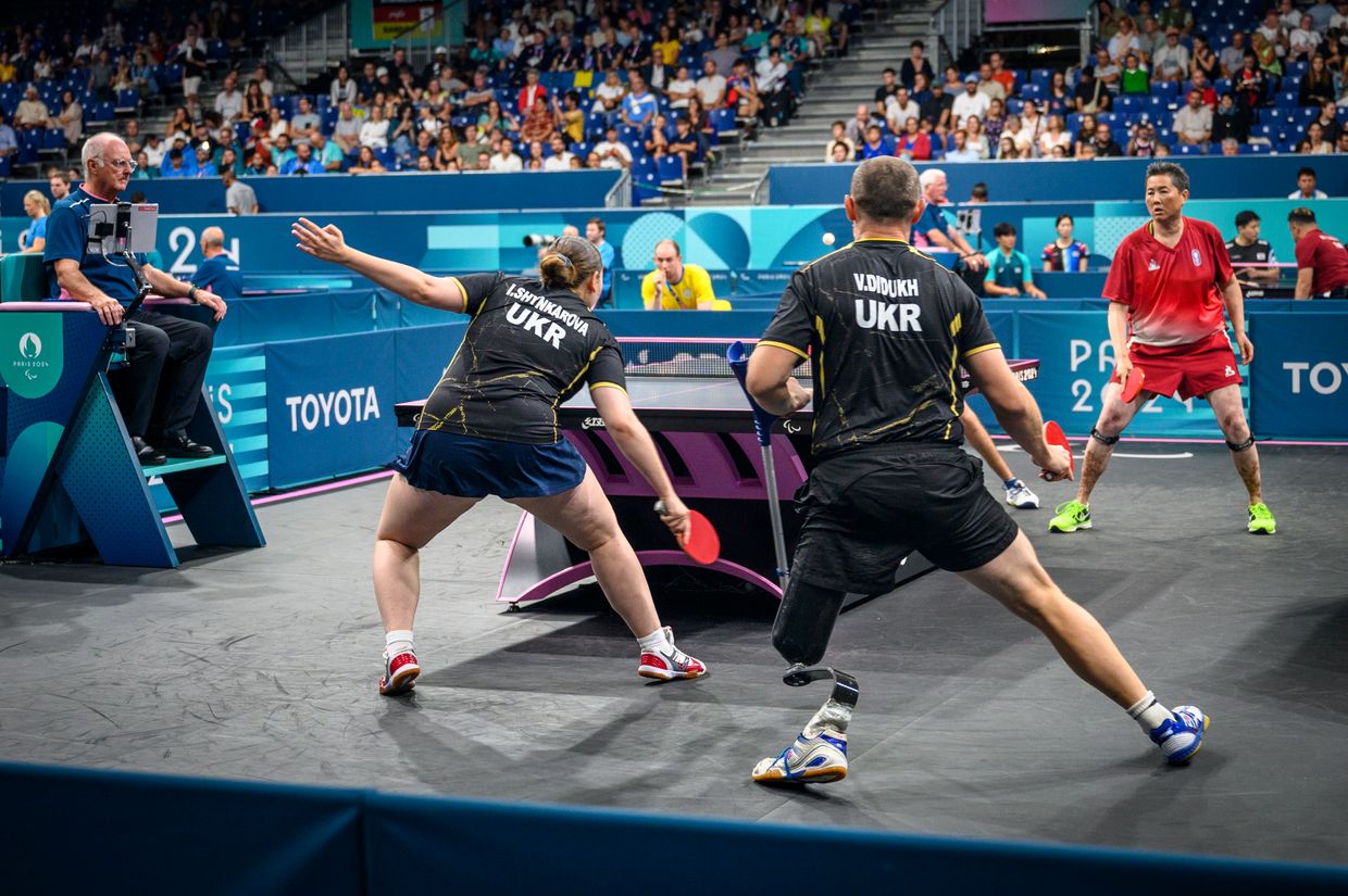 Iryna Shynkarova and Viktor Didukh play in mixed double para table tennis in Paris