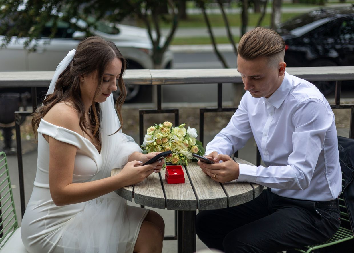 Olga Shevchenko and Mykyta Pukhkan are using a mobile app for a wedding ceremony 