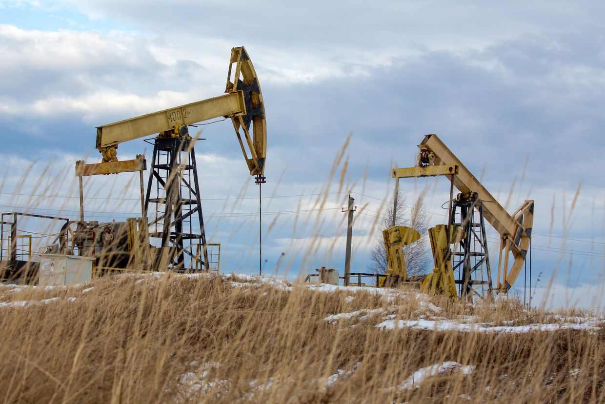 Oil pumping jacks, also known as "nodding donkeys", at a Rosneft Oil Co. oilfield in the Udmurt Republic, Russia