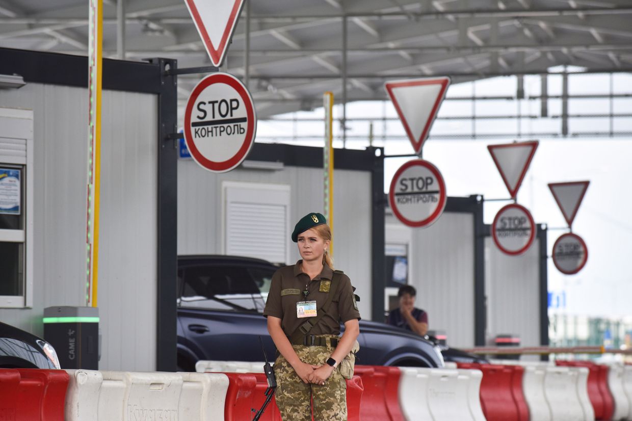 A border guard at the newly renovated checkpoint on the Ukrainian-Polish border near the village of Krakovets in Lviv Oblast