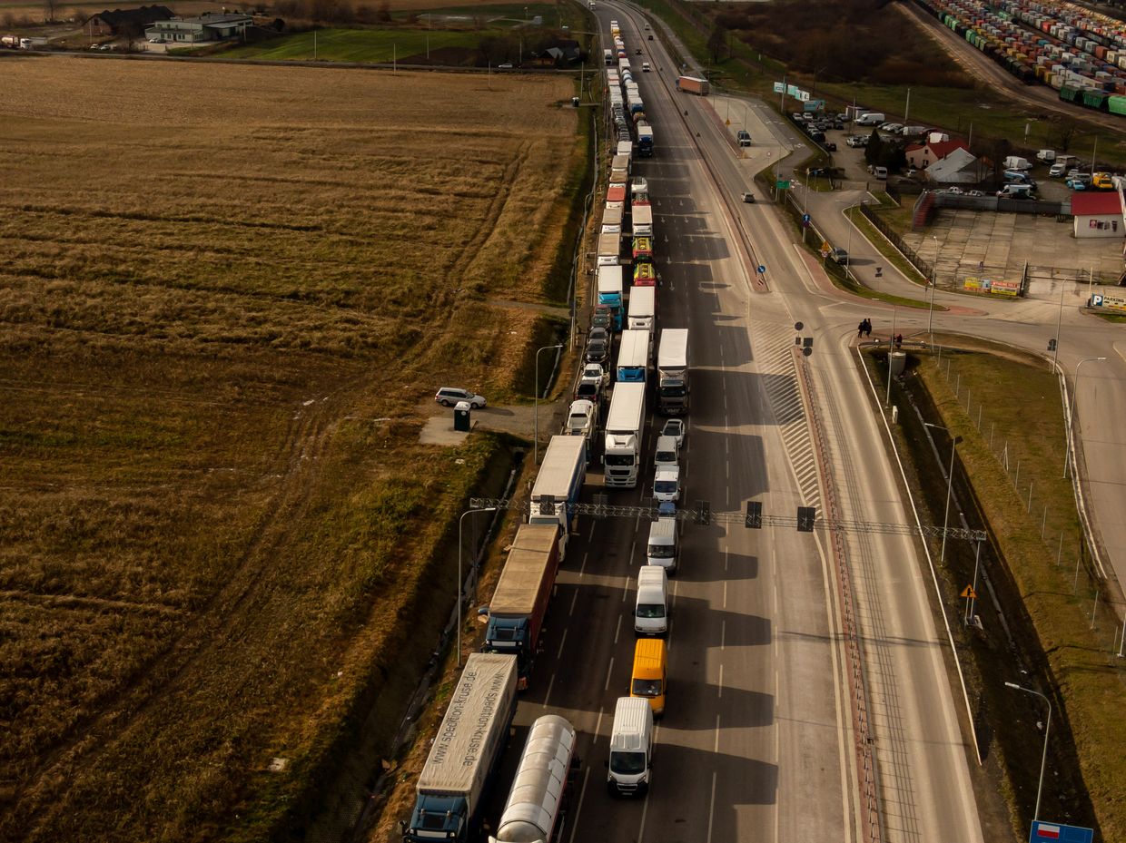 Trucks stand in a queue at the Medyka border crossing between Ukraine and Poland during a strike staged by farmers in Medyka, Poland on Nov. 28, 2023.