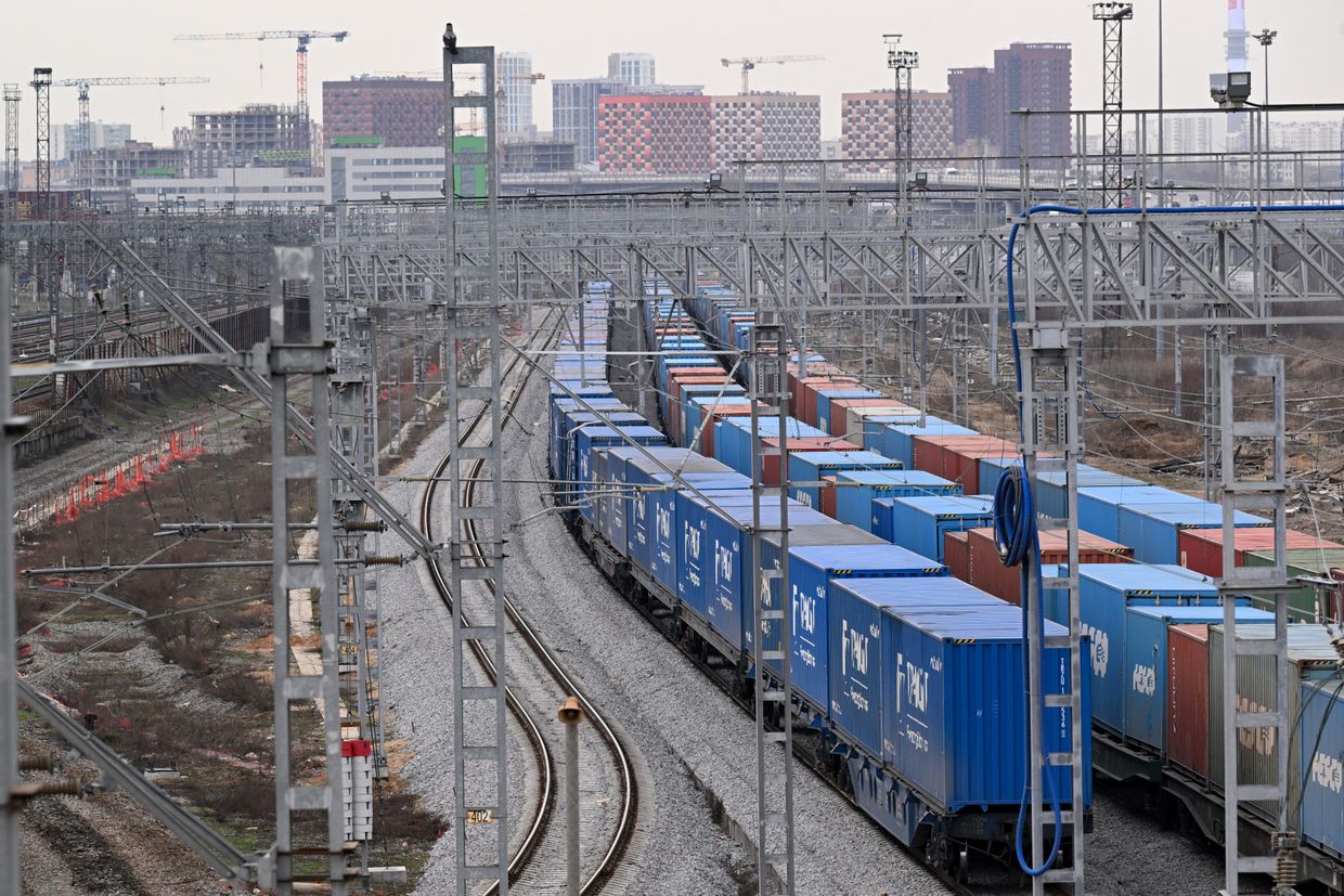  Shipping containers sit on rail trailers at a logistics hub outside Moscow, Russia, on Apr. 9, 2024.