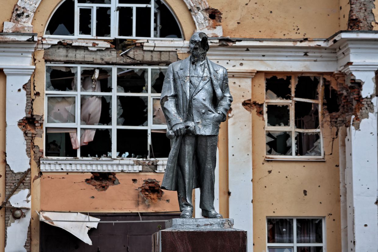 A damaged statue of the founder of the Soviet Union, Vladimir Lenin, in the Ukrainian-controlled Russian town of Sudzha