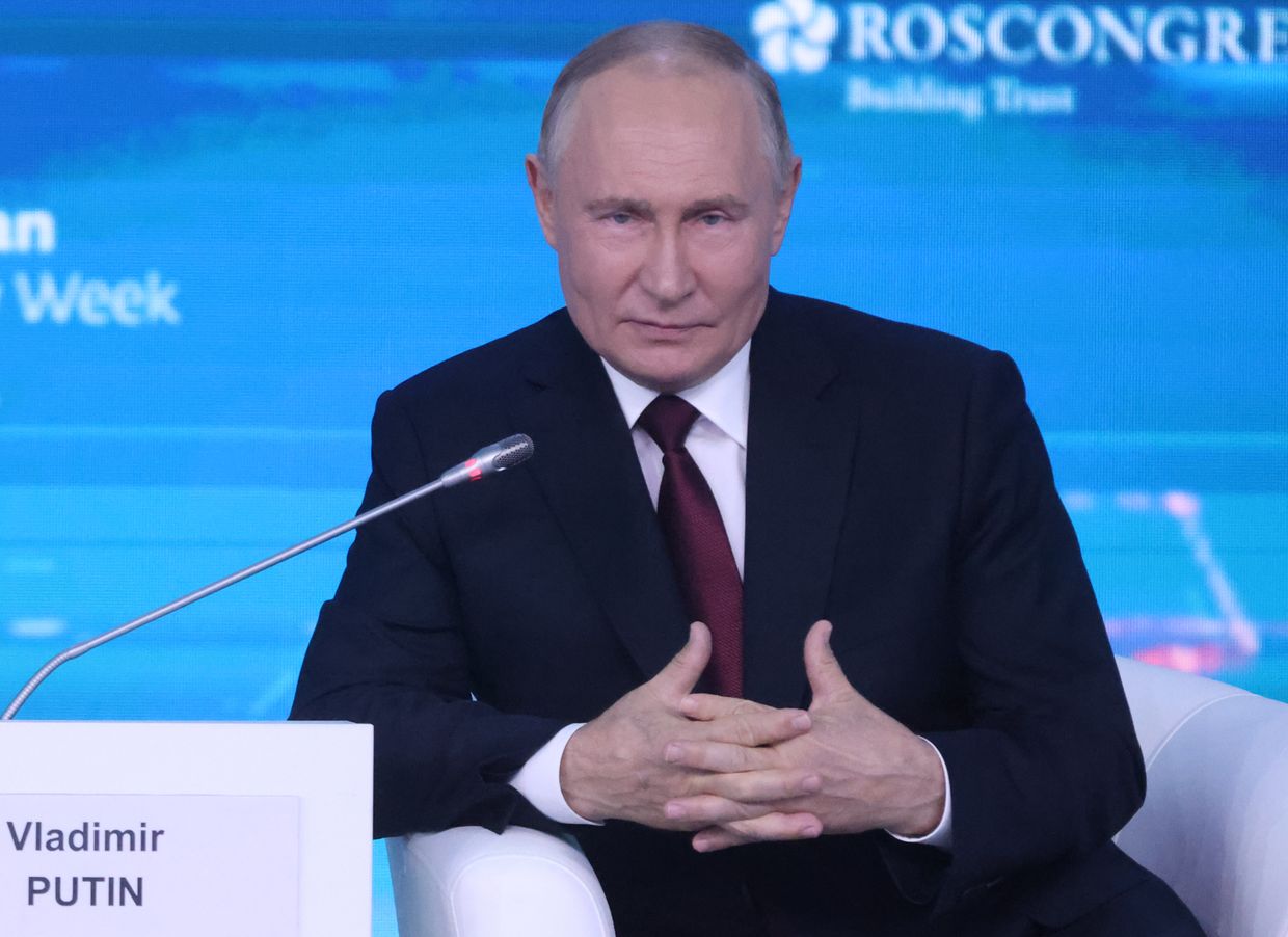 Russian President Vladimir Putin gestures during the plenary session of the Russian Energy Week 2024 